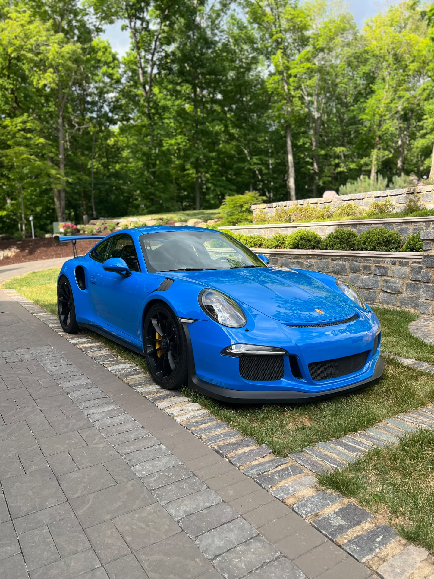 Blue Porsche 911 GT3 RS with a deep ceramic-coated shine